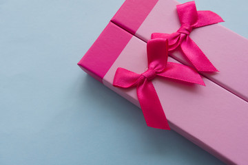 Gift box with a bow. Pink tone
