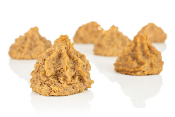 Group of six whole homemade brown coconut biscuit with chocolate isolated on white background