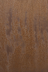 Rusted iron sheet with texture, rust and oxidized metal background. Old red iron panel with rust stains.