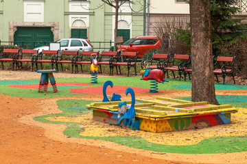 Fototapeta na wymiar a empty public colorful outdoor playground for small children in a center of Budapest