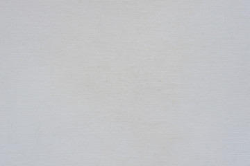 Surface texture of white corrugated paper, background.