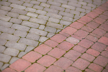 Background and texture of light brown stone paving slabs
