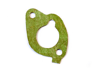 Gasket silencer, manifold, thermostat. Close-up. Copy space, on a white background. There is no...