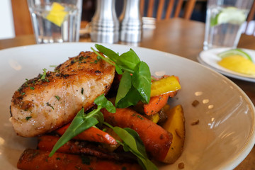 grilled salmon steak with vegetables and sauce