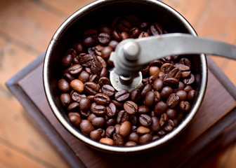 roasted coffee beans in grinder