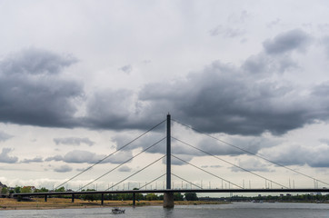 View at Oberkasseler bridge over Rhine river in Dusseldorf, Germany