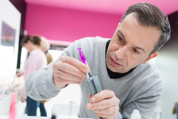 Fototapeta premium maintenance of electronic mod vaping device