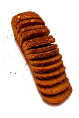 Fresh sliced multigrain bread isolated on white background.
