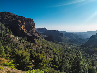 Green valley landscape with a sky blue in autumn at sunset
