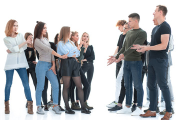 groups of young men and women standing opposite