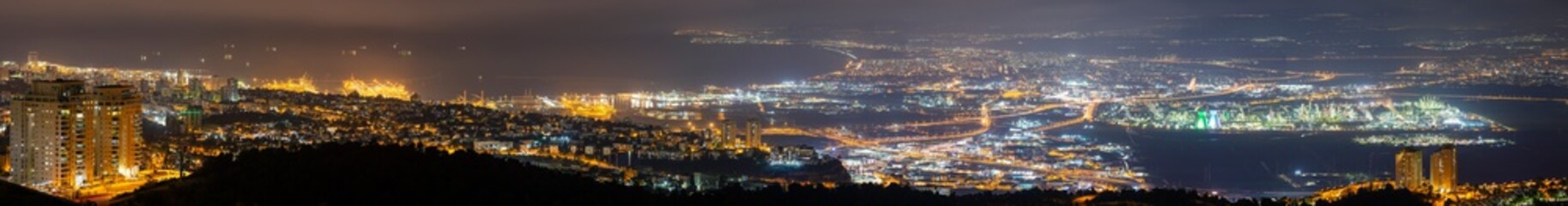 Fototapeta na wymiar Panorama Of Haifa At Night And Metropolitan Area And Industrial Zone of Haifa At Night, Aerial View, Israel