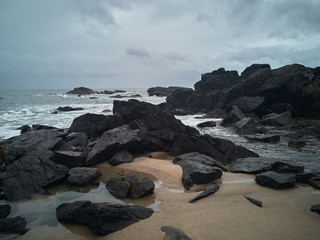 Fototapeta na wymiar Rocks on the beach after the storm
