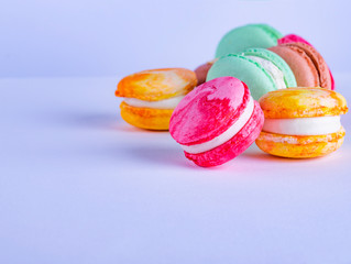Colorful macaroons on a light background