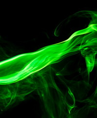 Green smoke on black background