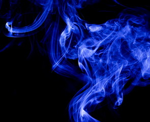 Blue smoke on black background