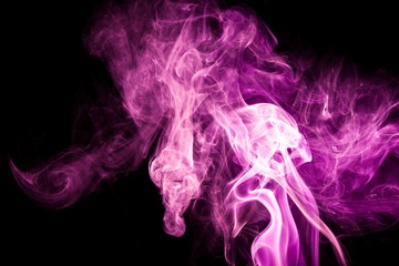 Purple smoke on black background
