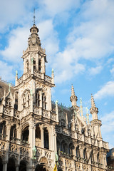 Fototapeta na wymiar Sunny detail view of the Gothic Revival architecture of the King's House building (1873) in the Grand Place, Brussels, Belgium 