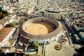 Fototapeta premium Round amphitheater, a city on the rocks of Ronda, Spain, Europe. White houses on a cliff