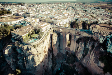 Round amphitheater, a city on the rocks of Ronda, Spain, Europe. White houses on a cliff