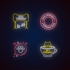 Cat and dog friendly areas emblems neon light icons set. Four-legged friends allowed territories. Kitty and doggy welcome. Signs with outer glowing effect. Vector isolated RGB color illustrations