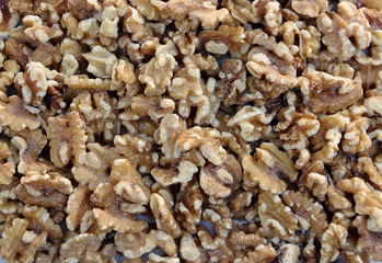 Full frame close-up view of raw organic walnut pieces