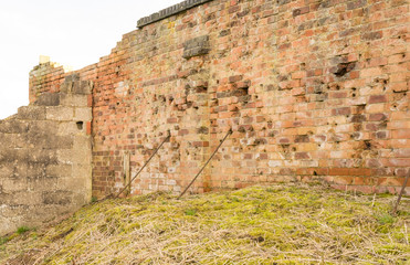 Old crumbling WW2 firing range brick wall