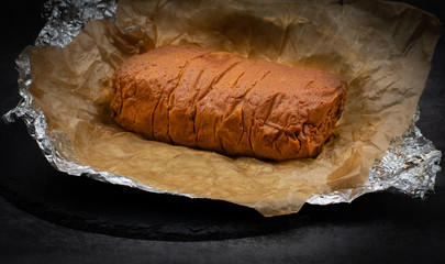 Vegan seitan ham prepared with wheat gluten and chickpea flour, soy sayce and spices