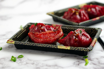 Pan fried beetroot pot stickers with spicy sauce