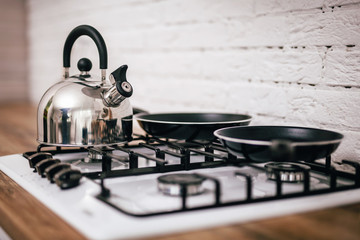 the stove on which the kettle stands