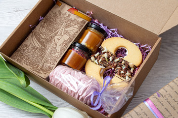 Festive packaging with the number eight, marshmallows and a can of caramel