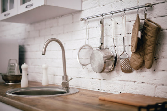 Faucet And Kitchen Tools Close-up