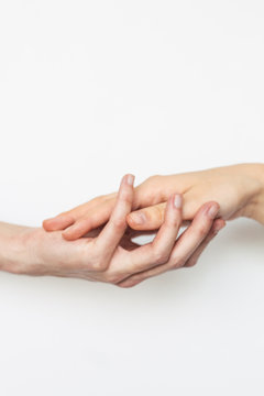 Hands Of Two People Isolated On White Background