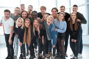 group of happy friends standing together . close up.