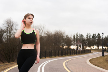 sexy girl runs in the park