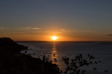 Fototapeta na wymiar View of wonderful sunset in Morro de Sao Paulo, Bahia, Brazil. Hill.