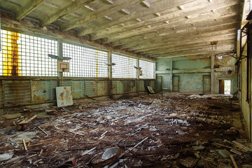 Abandoned school gym in ghost town Pripyat Chornobyl Zone