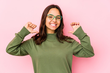 Young mixed race hispanic woman isolated feels proud and self confident, example to follow.