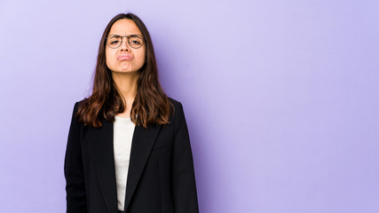 Young mixed race hispanic woman isolated sad, serious face, feeling miserable and displeased.