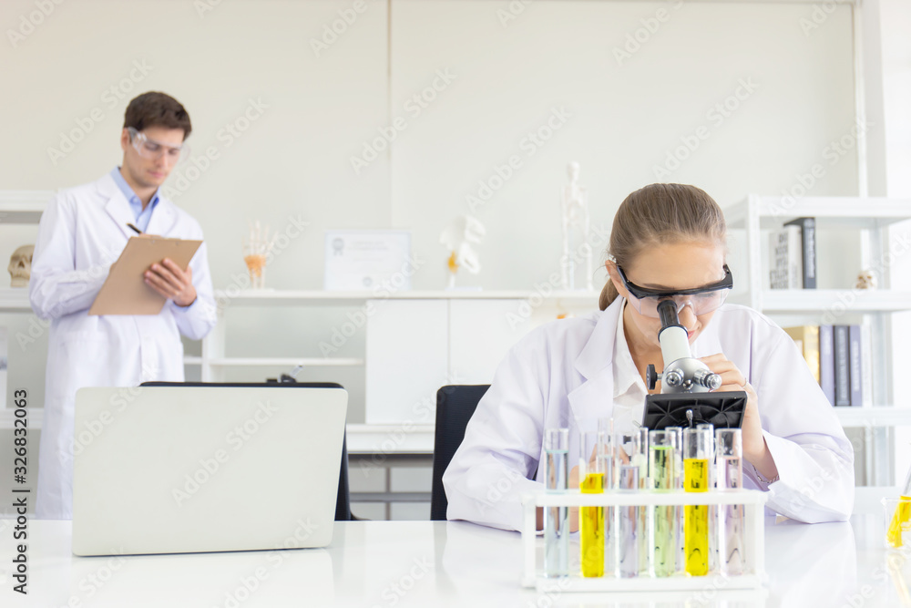 Poster concept of a healthcare researcher, a researcher working in a life science lab, a young research sci