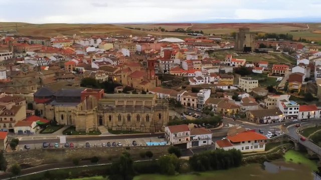Aerial video of Alba de Tormes, Salamanca, Spain on a cloudy day, left to right