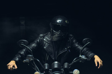  motorcyclist with smoke in the dark