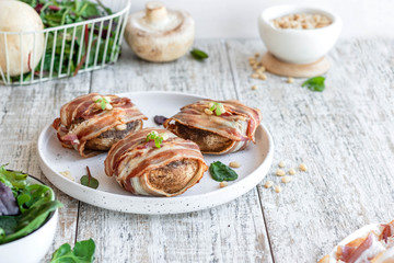 Baked mushrooms stuffed with cheese and pine nuts