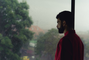 Young man looking away depressed