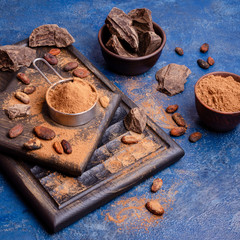 Cocoa powder in a metal sieve
