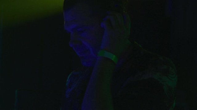 Close up of DJ rocking out to the music - shot on RED
