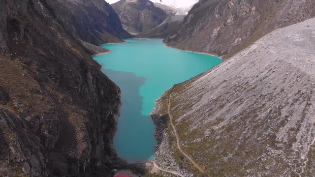 Paron lake, Tilt Reveal of the lake & mountain artesonraju, peru, anchash.