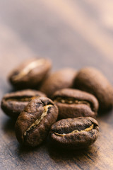 Coffee beans on a wooden table