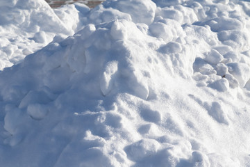 Snow cover snowdrift, snow background, snow texture.