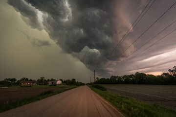 Storm brewing over a road in the Midwest 