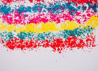 Abstract multicolor background with copy space. Celebration festival Holi. Indian Holi festival of colours concept. Colorful powder on white background.